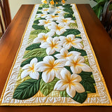 Caminito de mesa de quilting con diseño de plumeria